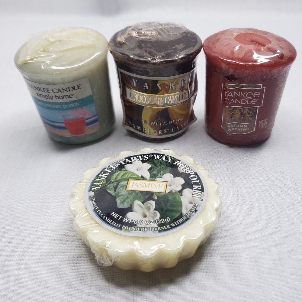 Three Yankee Candle Votive Candles and Tart Wax Melt